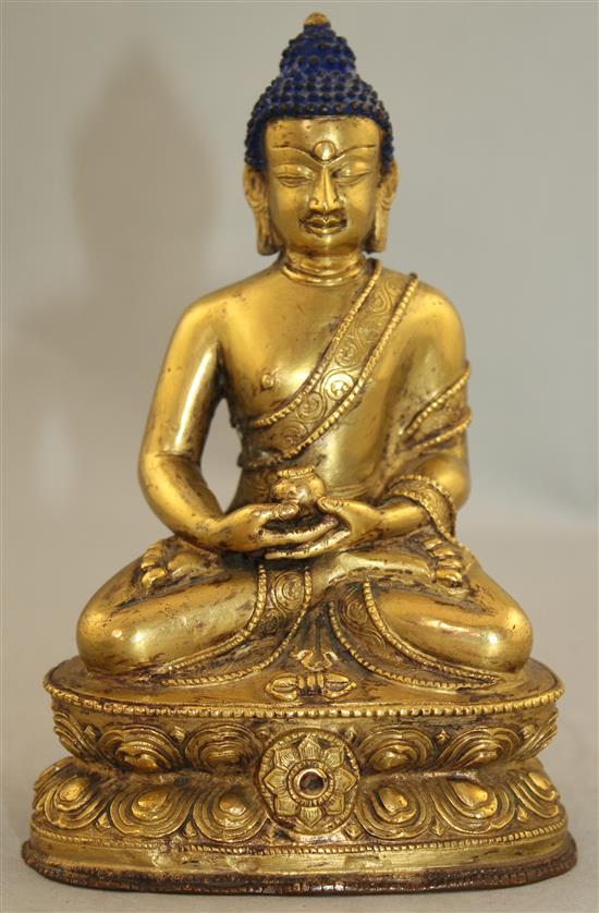 A Sino-Tibetan gilt bronze figure of Sakyamuni Buddha, 15.5cm